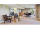 Finished basement featuring mirrored wall, bar, dining area and seating area at 9728 Ashleigh Ln, Highlands Ranch, CO 80126