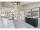 Neutral bedroom with a large window, providing plenty of natural light and pleasant views at 9728 Ashleigh Ln, Highlands Ranch, CO 80126
