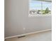 Neutral bedroom with a large window, offering pleasant views and natural light at 9728 Ashleigh Ln, Highlands Ranch, CO 80126