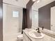 Bathroom featuring a shower/tub combo, granite counters, and hexagonal tile flooring at 10570 Worchester Dr, Commerce City, CO 80022