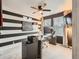 Office space featuring a ceiling fan, natural light, and a work desk at 10570 Worchester Dr, Commerce City, CO 80022