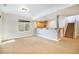 Finished basement with a bar area and staircase, offering additional living and entertaining space at 7998 Faith Ct, Frederick, CO 80530