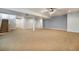 Large finished basement area featuring carpeting, neutral tones, and recessed lighting at 7998 Faith Ct, Frederick, CO 80530