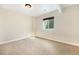 Bedroom with neutral carpeting, window, and base trim at 7998 Faith Ct, Frederick, CO 80530