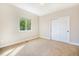 Cozy bedroom with neutral carpet and double door closet, filled with natural light at 7998 Faith Ct, Frederick, CO 80530