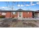 Charming brick ranch home with modern updates and landscaping at 3307 Teller St, Wheat Ridge, CO 80033