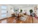 Living room featuring hardwood floors and a neutral color scheme at 3307 Teller St, Wheat Ridge, CO 80033