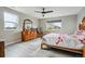 Bright bedroom with natural light, a ceiling fan, and stylish furnishings at 3165 W 63Rd Ave, Denver, CO 80221