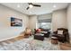 Cozy living room with hardwood floors, recessed lighting, a ceiling fan, and comfortable seating at 3165 W 63Rd Ave, Denver, CO 80221
