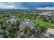 Beautiful aerial shot of the condo and golf course with mountain views in the background at 13961 E Marina Dr # 414, Aurora, CO 80014