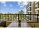 Balcony area overlooking lush landscaping and a neighborhood view at 13961 E Marina Dr # 414, Aurora, CO 80014