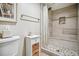 Modern bathroom with tiled shower, built-in bench, and stylish vanity, offering a serene and functional space at 13961 E Marina Dr # 414, Aurora, CO 80014