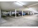 Well-lit parking garage with reserved parking spaces for residents at 13961 E Marina Dr # 414, Aurora, CO 80014