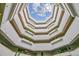 Stunning atrium with a skylight in the ceiling allowing natural light to pour into the building at 13961 E Marina Dr # 414, Aurora, CO 80014