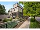This modern home offers a patio and backyard for outdoor living and entertaining at 3690 W Byron Pl, Denver, CO 80211