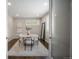 Contemporary dining room with stylish furniture, a light wood table and modern decor at 3690 W Byron Pl, Denver, CO 80211