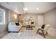 Comfortable living room featuring neutral tones, stylish sofas, and a striped area rug at 3690 W Byron Pl, Denver, CO 80211
