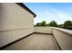 Outdoor deck features wood flooring and perimeter walls at 3690 W Byron Pl, Denver, CO 80211