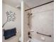 Updated bathroom featuring tile surround and modern fixtures at 7700 N Depew St # 1518, Arvada, CO 80003