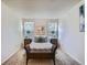 Serene bedroom featuring soft lighting, neutral tones, and cozy furnishings at 7700 N Depew St # 1518, Arvada, CO 80003