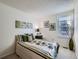 Cozy bedroom with natural light from the large window at 7700 N Depew St # 1518, Arvada, CO 80003