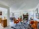 Open floor plan featuring living, dining, and kitchen areas creating a seamless flow for modern living at 7700 N Depew St # 1518, Arvada, CO 80003