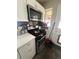 Well-equipped kitchen featuring modern appliances and ample countertop space for cooking at 2655 Pontiac St, Denver, CO 80207