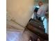 A stairway leading to the basement of this home at 2655 Pontiac St, Denver, CO 80207