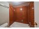 Tiled shower/tub with updated fixtures, offering a clean and modern bathing experience at 4801 E 9Th Ave # 108S, Denver, CO 80220