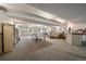 Spacious game room with a ping pong table and sitting area, perfect for community entertainment at 4801 E 9Th Ave # 108S, Denver, CO 80220