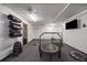 Bright gym with fitness equipment like mini trampolines, yoga mats, and dumbbell sets at 4801 E 9Th Ave # 108S, Denver, CO 80220