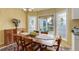Cozy dining room featuring decorative windows, hardwood floors, and classic furniture at 31 N Algonquian St, Aurora, CO 80018