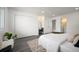 Stylish bedroom with a vanity, closet, and modern decor for comfortable living at 2123 N Coronado Pkwy # C, Denver, CO 80229