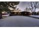 House front view with snowy lawn and modern design at 6127 S Westview St, Littleton, CO 80120