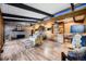 Bright and airy living room with hardwood floors and fireplace at 6127 S Westview St, Littleton, CO 80120