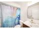 Bathroom with shower, modern vanity, and stylish decor at 5217 E Martin Luther King Jr Blvd, Denver, CO 80207