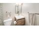 Clean bathroom with modern vanity, mirror, and updated fixtures at 5217 E Martin Luther King Jr Blvd, Denver, CO 80207