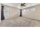 Bedroom featuring neutral walls and multiple windows at 20830 Scenic Park Dr, Parker, CO 80138