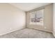 Neutral bedroom featuring a large window that lets in ample natural light at 20830 Scenic Park Dr, Parker, CO 80138