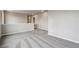 Upstairs loft with neutral carpet and walls, ideal for a flexible living or office space at 2267 Peregrine Dr, Brighton, CO 80601