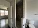Tiled walk-in shower and toilet in the bathroom at 6100 Bluestem # 238, Frederick, CO 80530