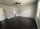 Spacious bedroom featuring wood floors and a ceiling fan at 6100 Bluestem # 238, Frederick, CO 80530