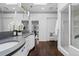 Bright bathroom featuring dual vanities, walk-in shower, and separate tub at 1940 Blake St # 300, Denver, CO 80202