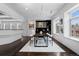 Elegant dining area with a modern table, stylish chairs, and ample natural light at 1940 Blake St # 300, Denver, CO 80202