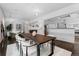 Spacious dining room with a large table, modern decor, and seamless flow to other spaces at 1940 Blake St # 300, Denver, CO 80202