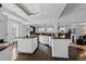 Well-lit kitchen with black countertop island, white cabinets, and stainless steel dishwasher at 1940 Blake St # 300, Denver, CO 80202