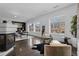 Bright living room with modern fireplace, large windows, and stylish decor at 1940 Blake St # 300, Denver, CO 80202