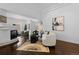 Contemporary living area with sleek furniture, a modern fireplace, and ample natural light at 1940 Blake St # 300, Denver, CO 80202