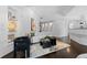 Bright and open living area with modern furniture, unique artwork, and a cozy atmosphere at 1940 Blake St # 300, Denver, CO 80202