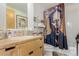 Stylish bathroom with a modern vanity, unique shower curtain, and contemporary fixtures at 2100 16Th St # 606, Denver, CO 80202
